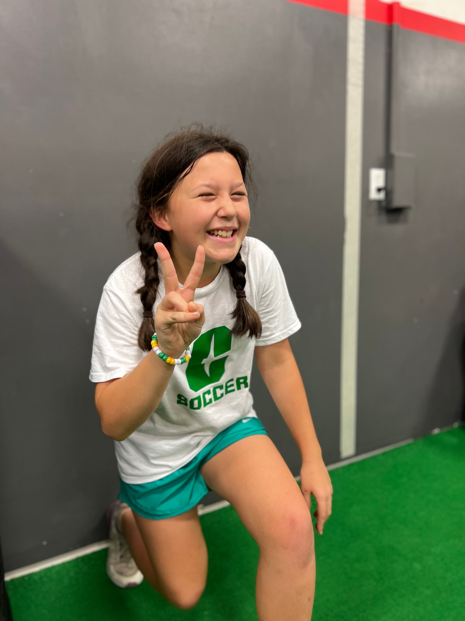 kid smiling while exercising